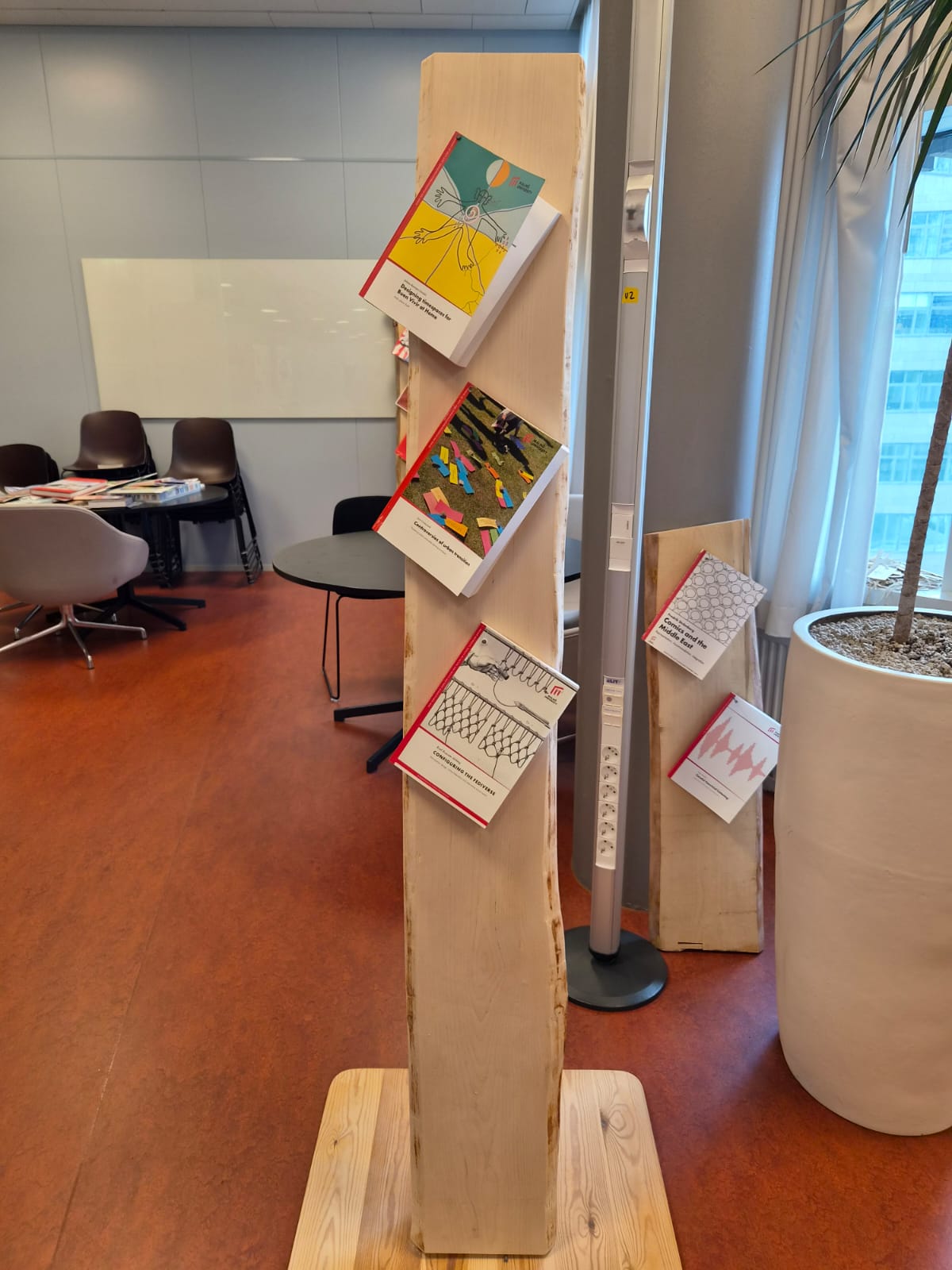 Publishing the thesis by nailing it to the board at Malmö University.